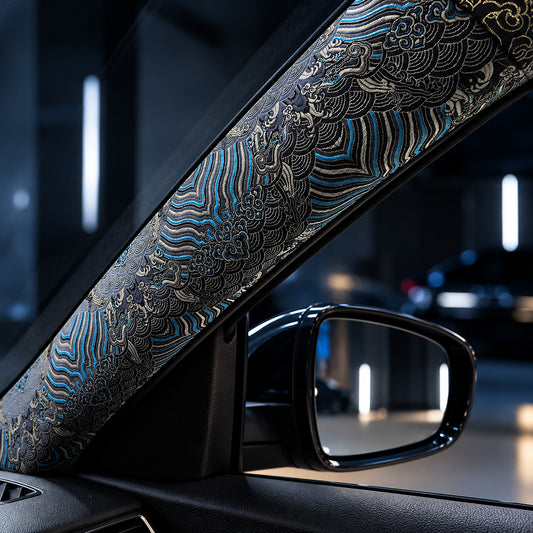 Blue embroidered pillar wrap fitted to a car A-pillar