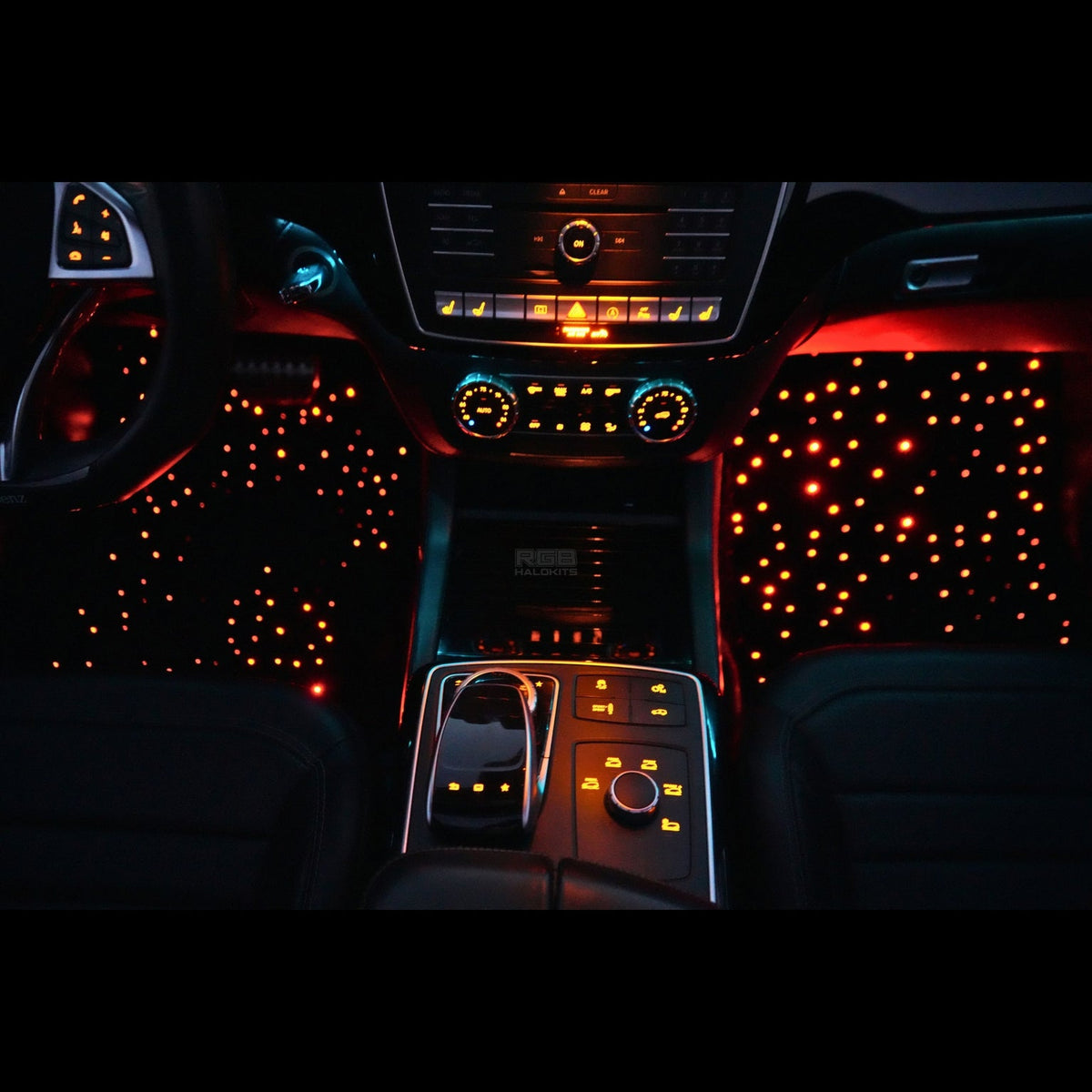 Starlight floor mats lit in a car interior